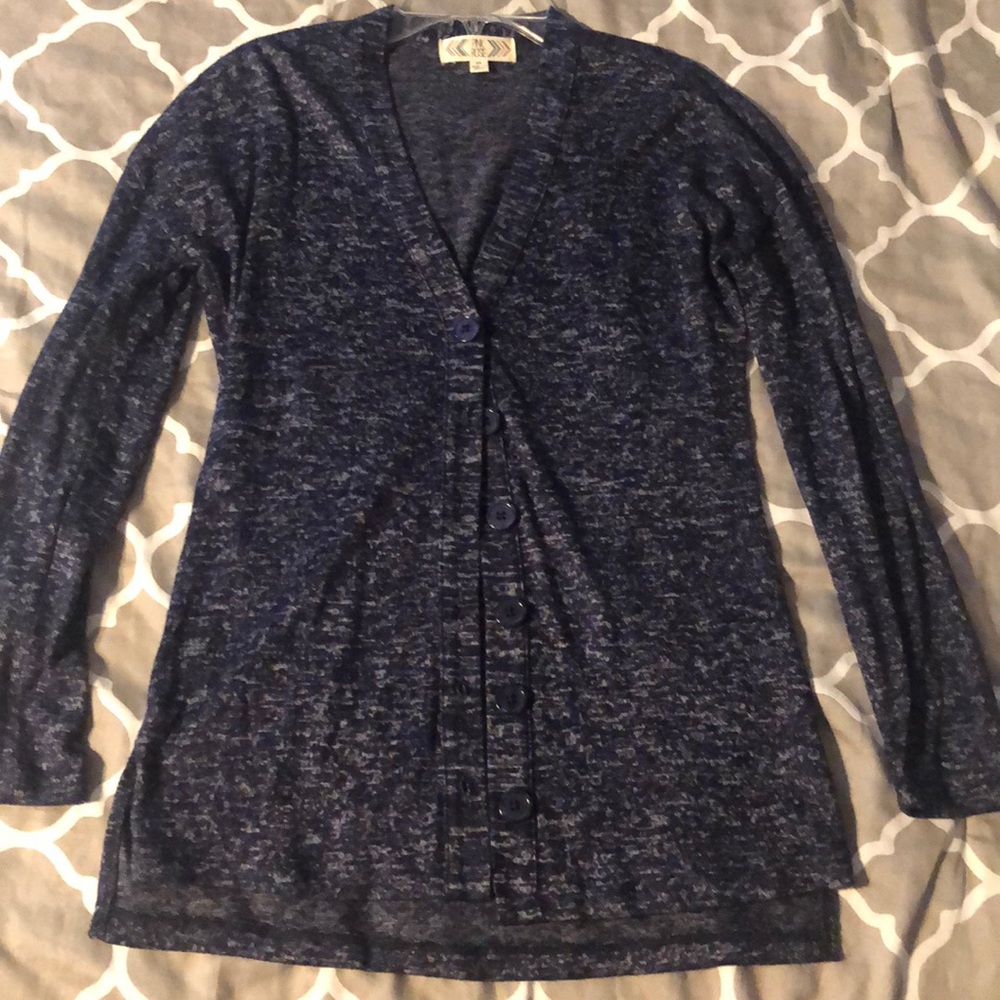 A navy blue and white cardigan